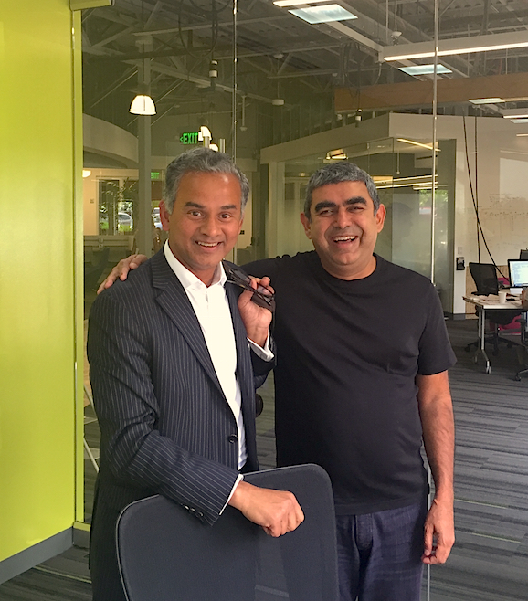Two CEOs clearly up to no good... Genpact's Tiger Tyagarajan (left) and Infosys' Vishal Sikka (right)